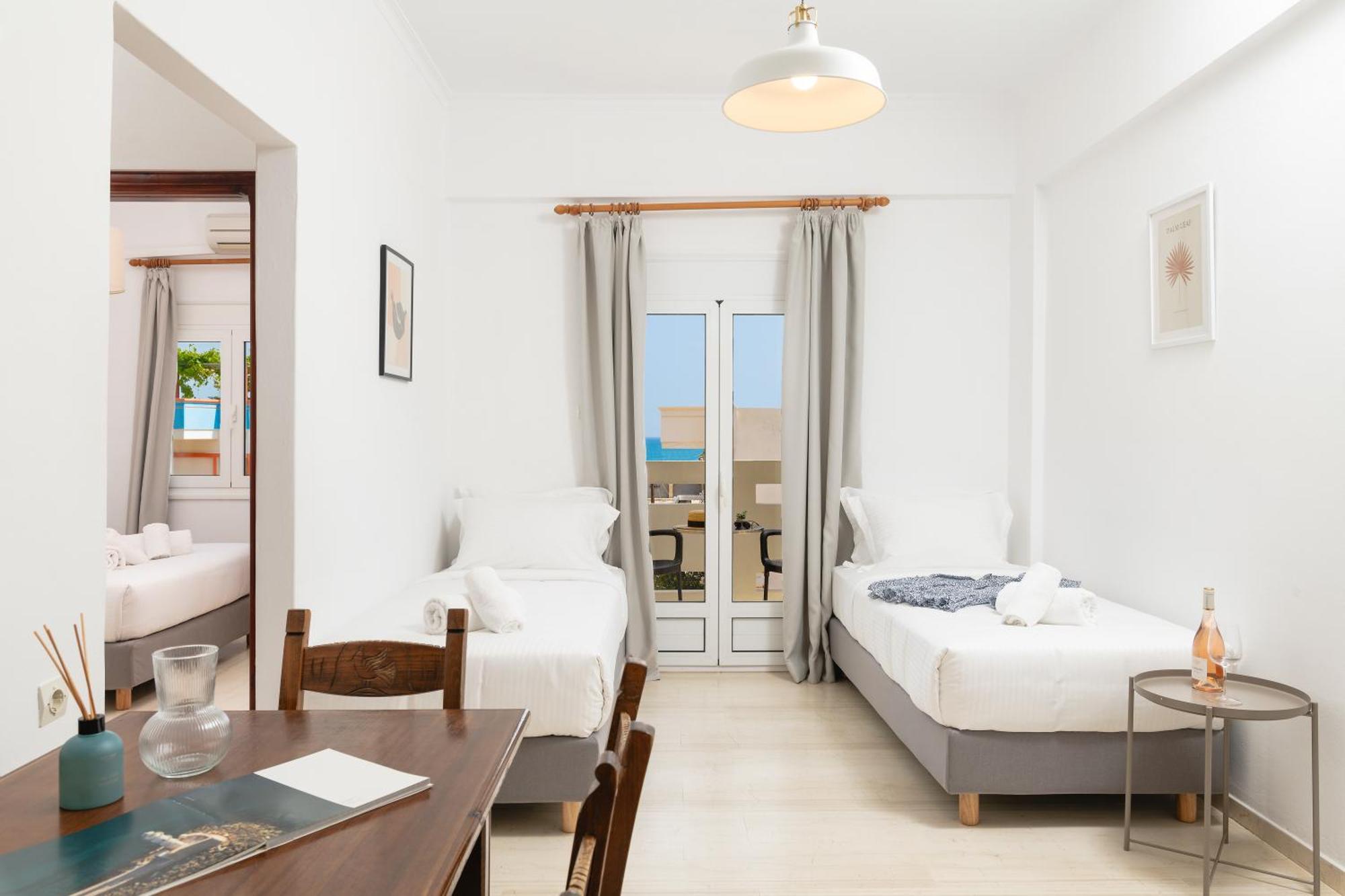 Thelesi Apartments Stalos Bagian luar foto